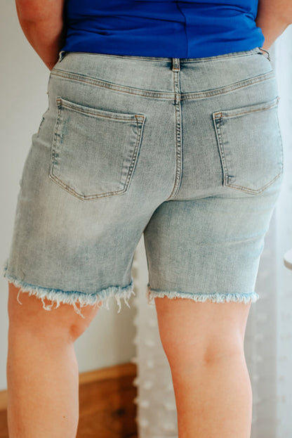 Short en jean bleu clair grande taille à ourlet roulé vieilli Informations